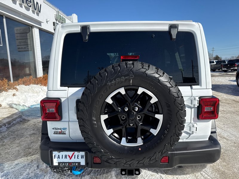 2024 Jeep Wrangler 4xe Rubicon Demo with 21,000 off sky, active roof, winch, steel bumpers sticker prices, 88K