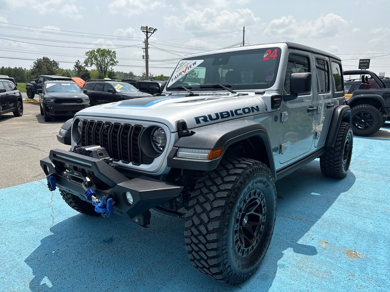 2024 Jeep Wrangler 4xe Rubicon extreme package Upgraded tires, upgraded rims, upgraded winch, and bumpers