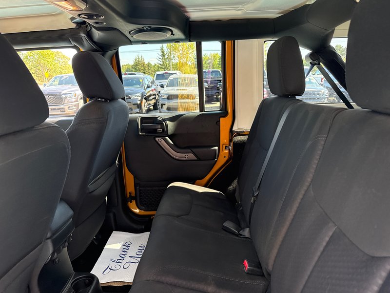 2014 Jeep Wrangler Unlimited Sport Amazing condition, power windows, AC, etc.