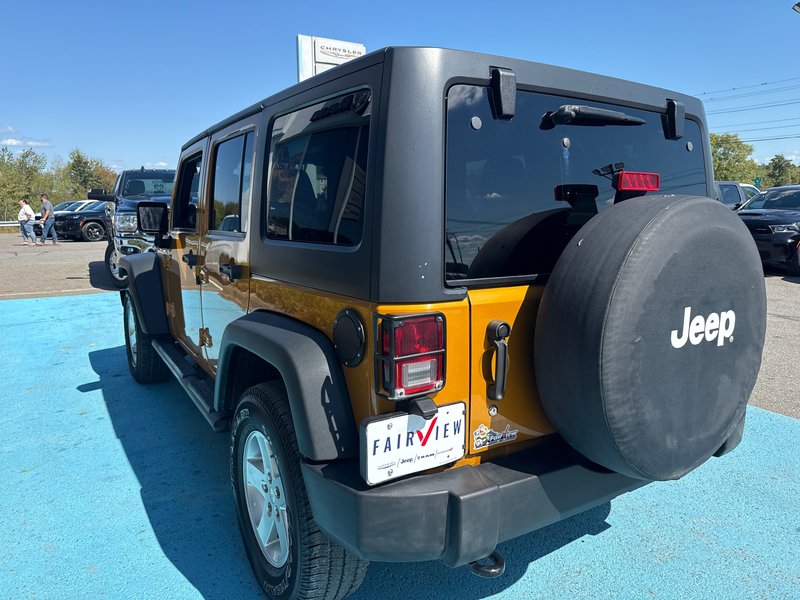 2014 Jeep Wrangler Unlimited Sport Amazing condition, power windows, AC, etc.