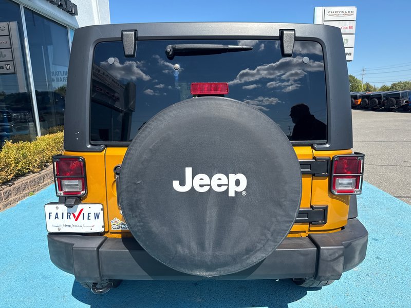 2014 Jeep Wrangler Unlimited Sport Amazing condition, power windows, AC, etc.