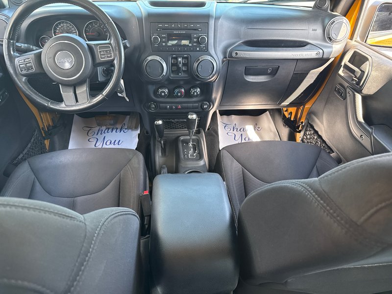 2014 Jeep Wrangler Unlimited Sport Amazing condition, power windows, AC, etc.