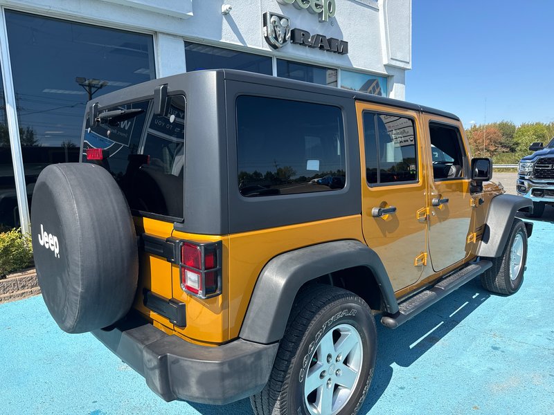 2014 Jeep Wrangler Unlimited Sport Amazing condition, power windows, AC, etc.