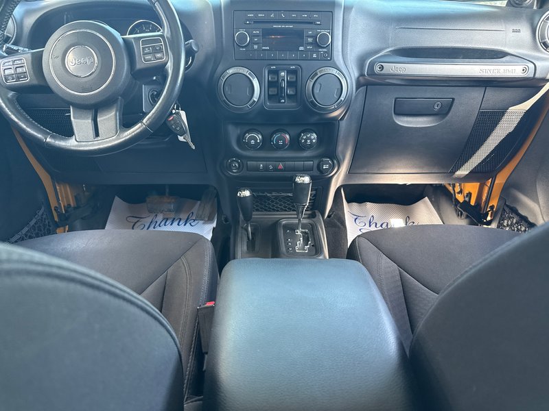 2014 Jeep Wrangler Unlimited Sport Amazing condition, power windows, AC, etc.
