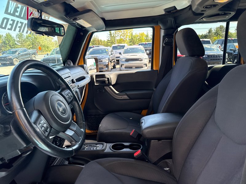 2014 Jeep Wrangler Unlimited Sport Amazing condition, power windows, AC, etc.