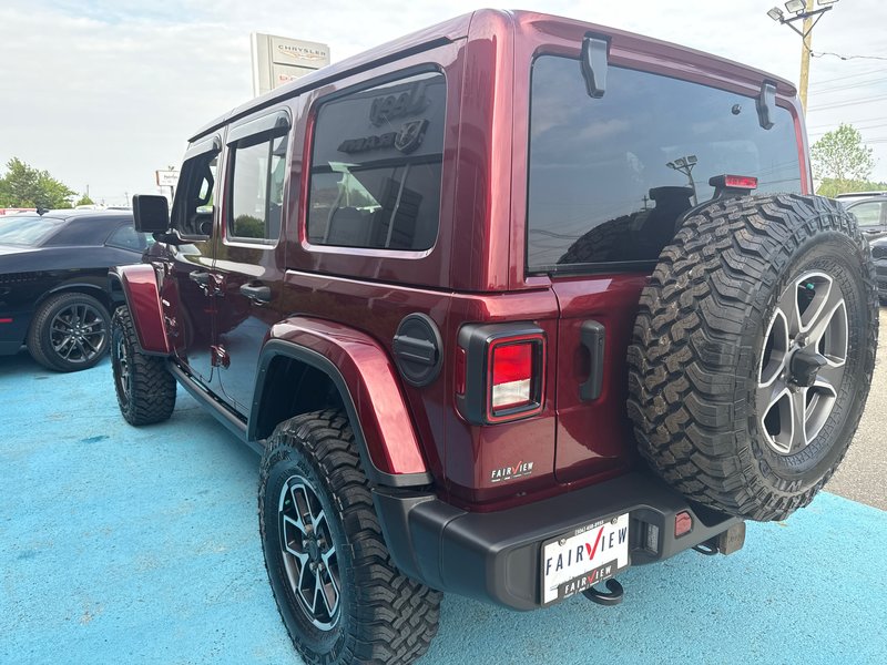 2021 Jeep Wrangler Unlimited Sahara leather loaded Fox lift kit, package brand new Rubicon rims and wild teak tires !!