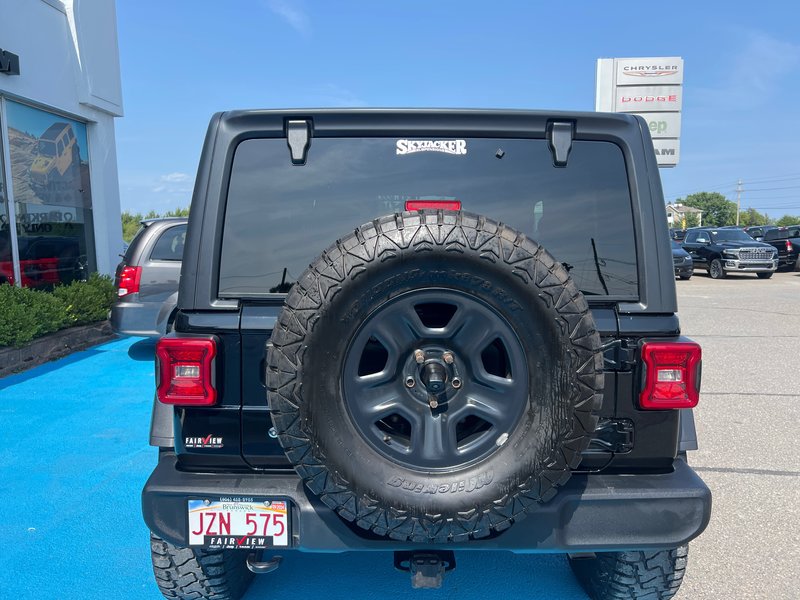 2022 Jeep Wrangler Sport with 10k in accessories With it 4 inch lift kit, 35 inch tire and wheel package, bumpers, fender, flares, and much more