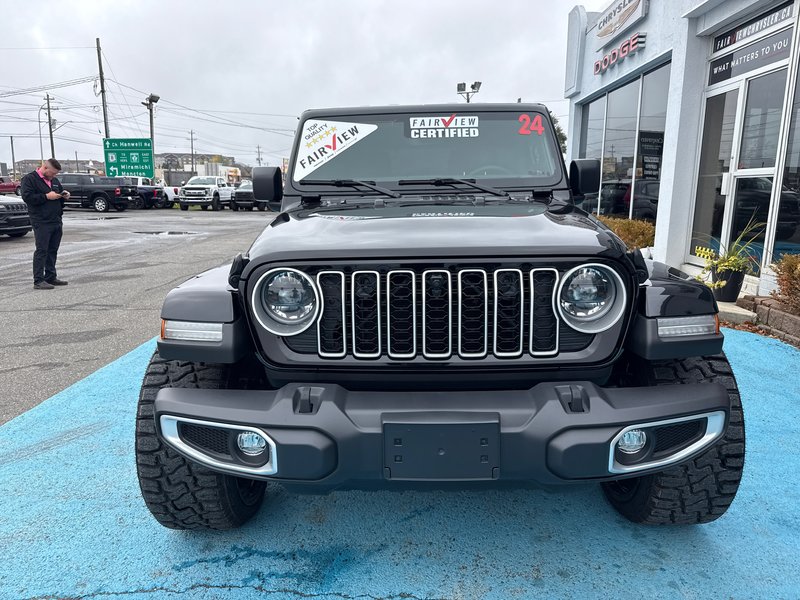 2024 Jeep Wrangler Sahara Fully loaded leather colour matching top over $7000 in tires and rims