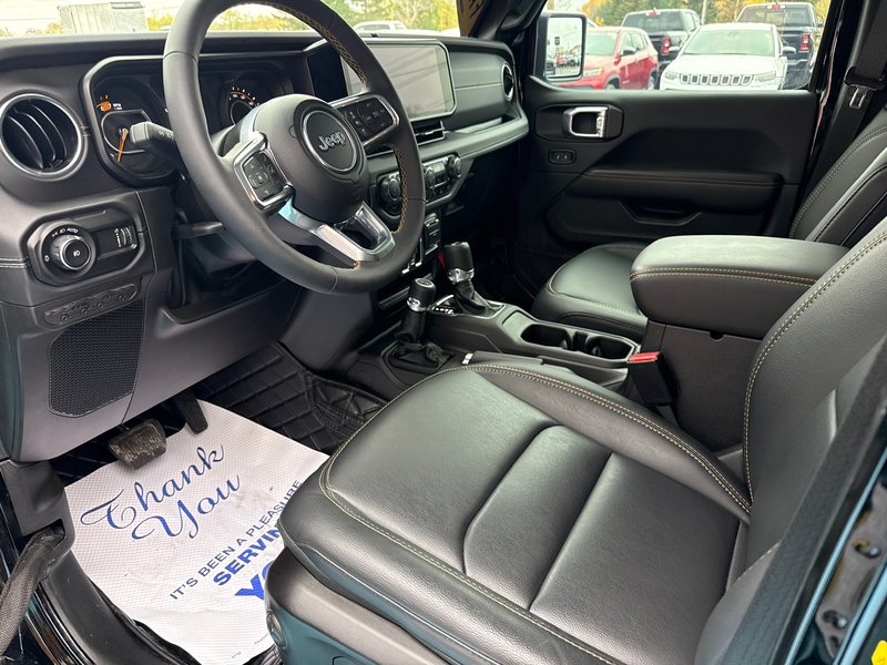 2024 Jeep Wrangler Sahara Fully loaded leather colour matching top over $7000 in tires and rims