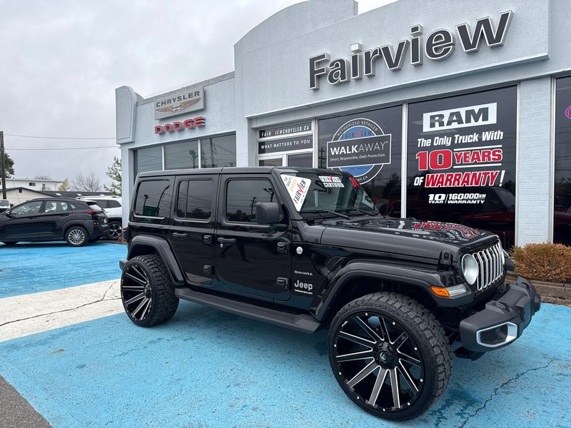 2024 Jeep Wrangler Sahara Fully loaded leather colour matching top over $7000 in tires and rims