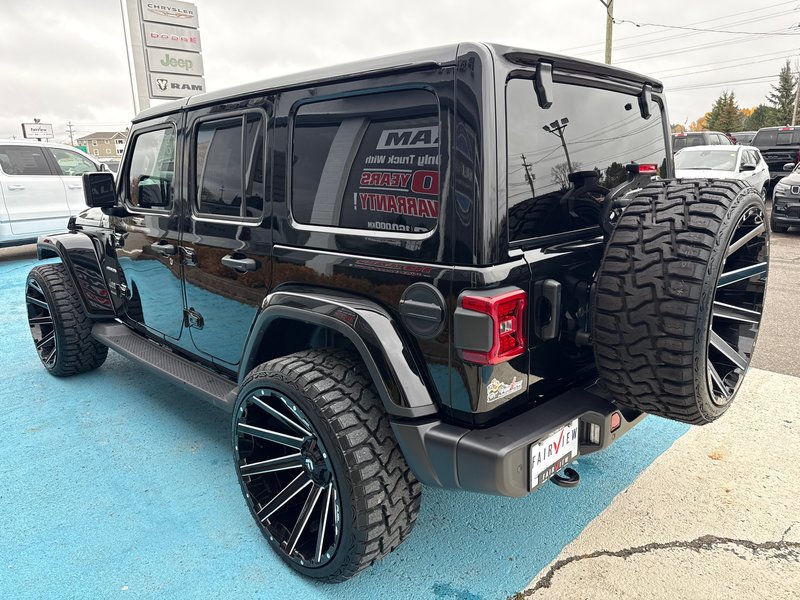 2024 Jeep Wrangler Sahara Fully loaded leather colour matching top over $7000 in tires and rims