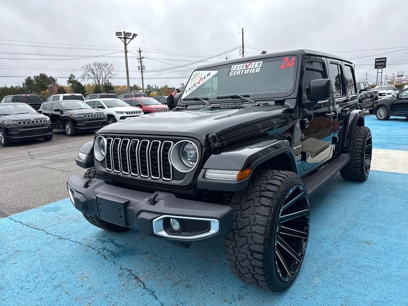 2024 Jeep Wrangler Sahara Fully loaded leather colour matching top over $7000 in tires and rims