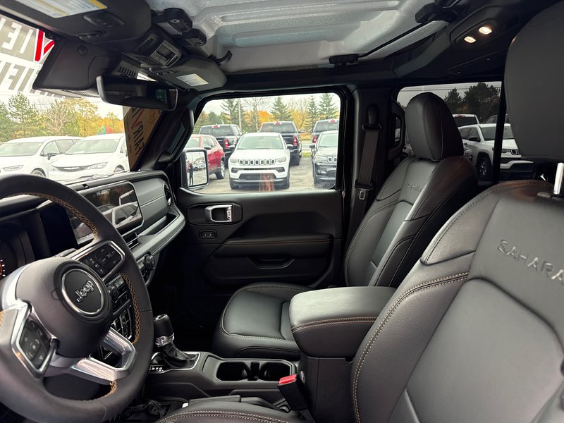 2024 Jeep Wrangler Sahara Fully loaded leather colour matching top over $7000 in tires and rims
