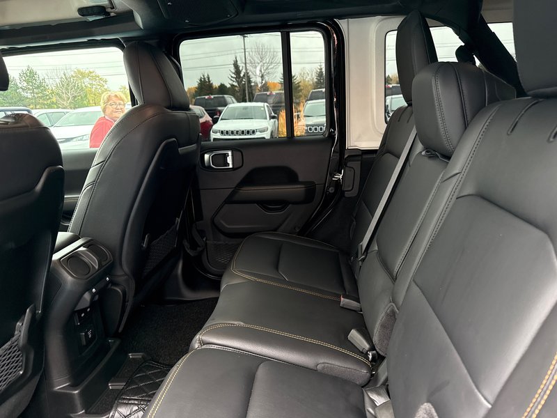 2024 Jeep Wrangler Sahara Fully loaded leather colour matching top over $7000 in tires and rims