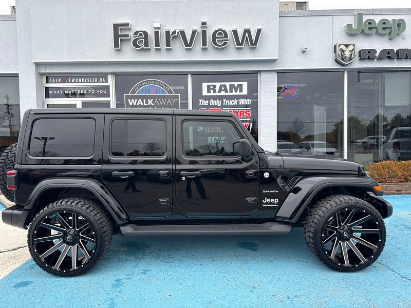 2024 Jeep Wrangler Sahara Fully loaded leather colour matching top over $7000 in tires and rims