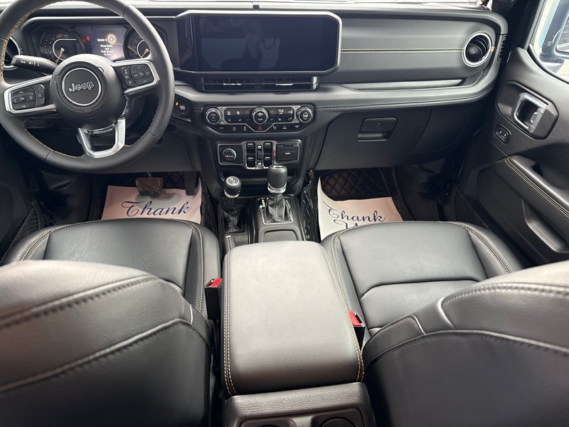 2024 Jeep Wrangler Sahara Fully loaded leather colour matching top over $7000 in tires and rims