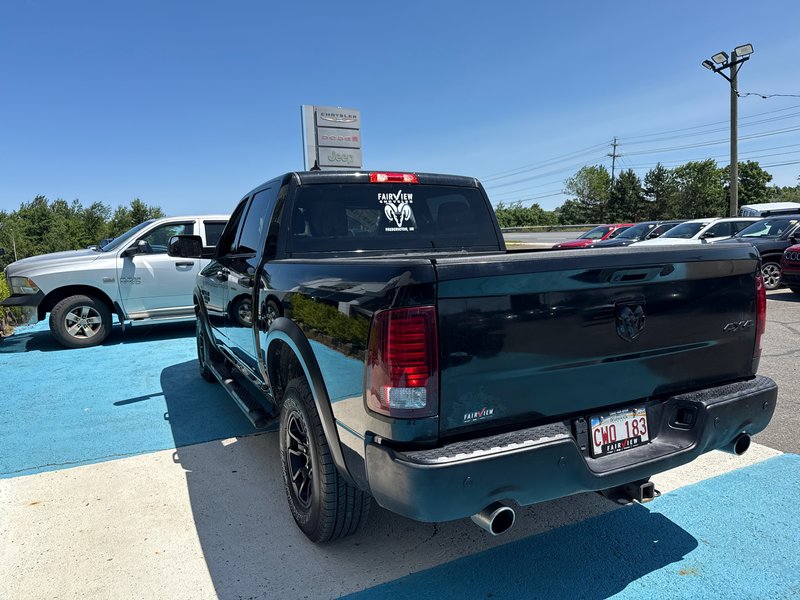 2021 Ram 1500 Classic Warlock V8 hemi Loaded with a sunroof, heated seat, heated wheel navigation, etc.