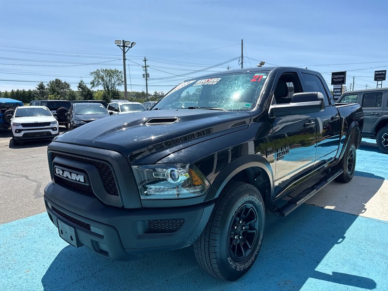 2021 Ram 1500 Classic Warlock V8 hemi Loaded with a sunroof, heated seat, heated wheel navigation, etc.