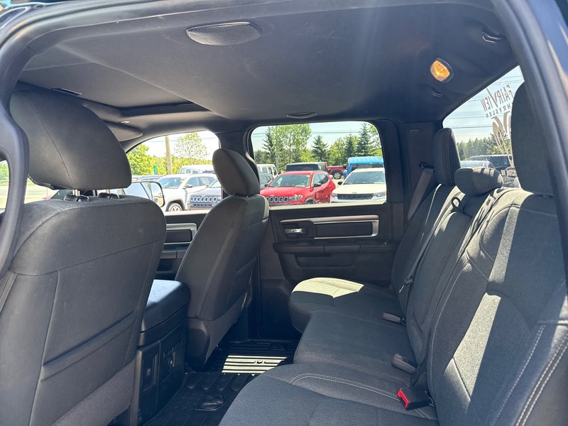 2021 Ram 1500 Classic Warlock V8 hemi Loaded with a sunroof, heated seat, heated wheel navigation, etc.