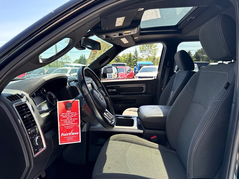 2021 Ram 1500 Classic Warlock V8 hemi Loaded with a sunroof, heated seat, heated wheel navigation, etc.