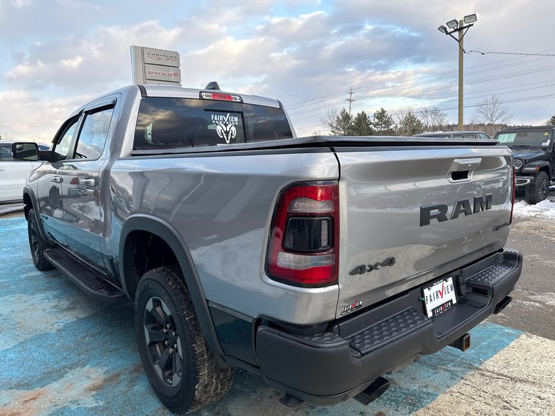 2019 Ram 1500 Rebel  aftermarket exhaust, full panel roof 12 inch screen Alpine audio much more