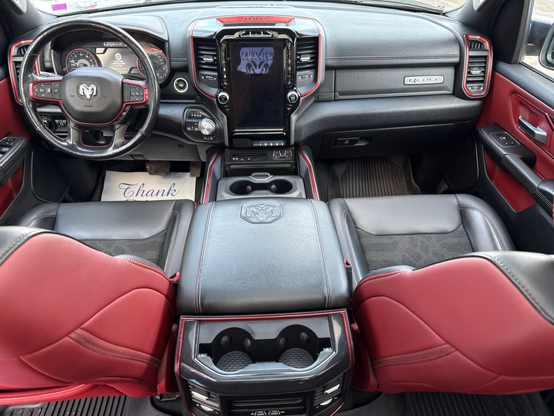 2019 Ram 1500 Rebel  aftermarket exhaust, full panel roof 12 inch screen Alpine audio much more