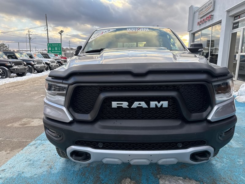 2019 Ram 1500 Rebel  aftermarket exhaust, full panel roof 12 inch screen Alpine audio much more