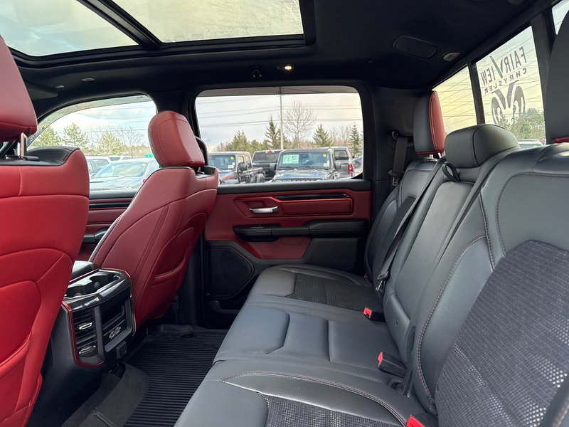 2019 Ram 1500 Rebel  aftermarket exhaust, full panel roof 12 inch screen Alpine audio much more