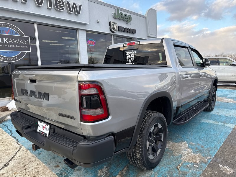 2019 Ram 1500 Rebel  aftermarket exhaust, full panel roof 12 inch screen Alpine audio much more