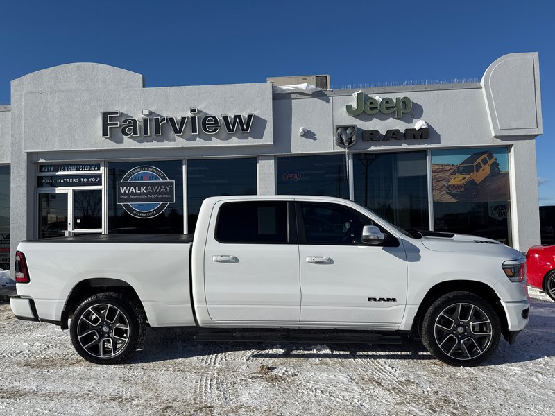 2021 Ram 1500 Sport Upgraded rims and tires, hard tunnel, cover side steps