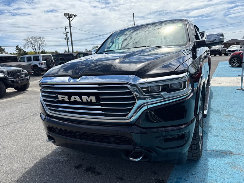 2022 Ram 1500 Limited Longhorn Fully loaded hard Tonnele cover, upgraded tires, cool seating heated seating 12 inch screen, etc.