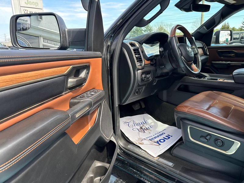 2022 Ram 1500 Limited Longhorn Fully loaded hard Tonnele cover, upgraded tires, cool seating heated seating 12 inch screen, etc.