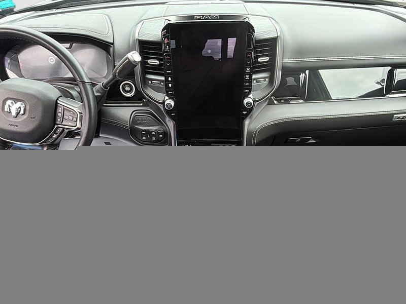 2026 Ram 2500 Rebel Three TV screens two charging stations air rise suspension MSRP 118,987