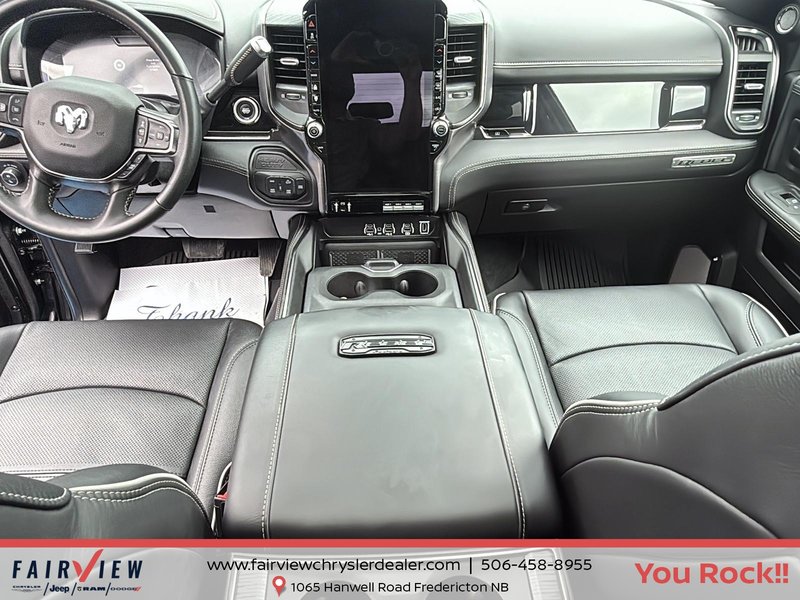 2026 Ram 2500 Rebel Three TV screens two charging stations air rise suspension MSRP 118,987