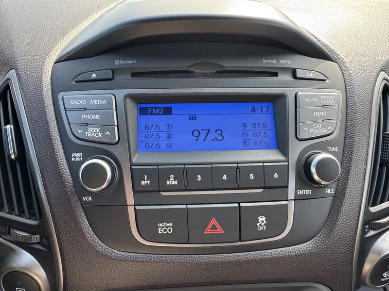 Hyundai Tucson GL TA DEMARREUR SIEGES CHAUFFANTS BLUETOOTH 2015 INSPECTE+AIR CLIMATISE+RADIO SIRIUS+REGULATEUR DE VITESSES+GROUPE ELECTRIQUE+COMMANDES AU VOLANT