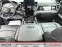 2026 Ram 2500 Rebel Three TV screens two charging stations air rise suspension MSRP 118,987