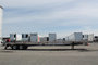 Tandem axle flatbed for short-term rental at Location Brossard