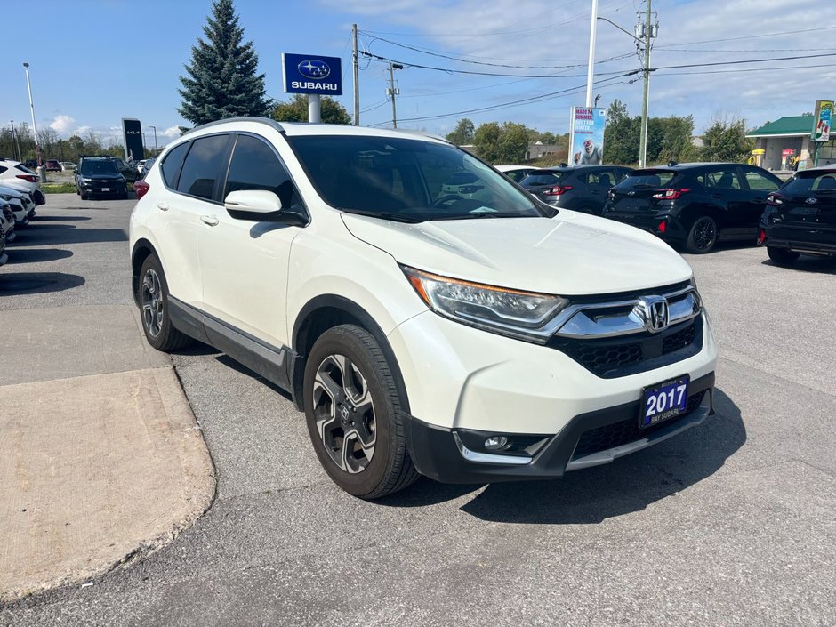 2017 Honda CR-V Touring Great condition. Includes snows on Alloy rims.