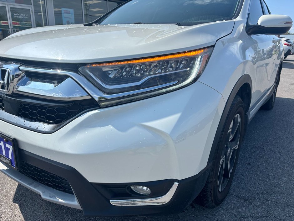 2017 Honda CR-V Touring Great condition. Includes snows on Alloy rims.
