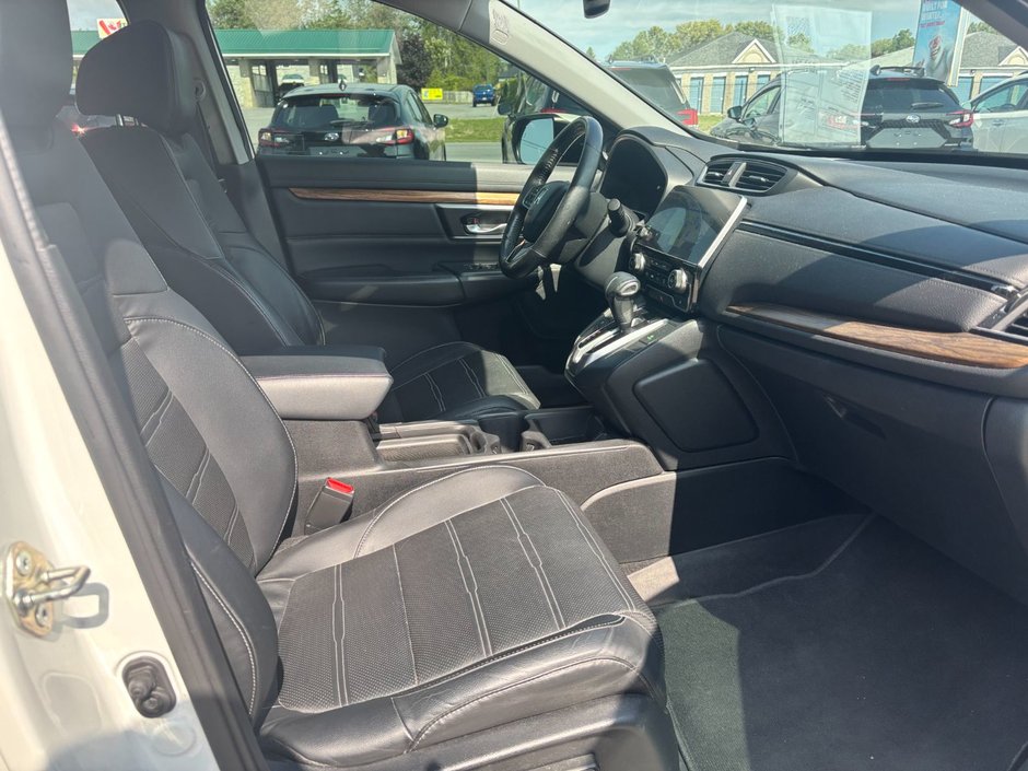 2017 Honda CR-V Touring Great condition. Includes snows on Alloy rims.