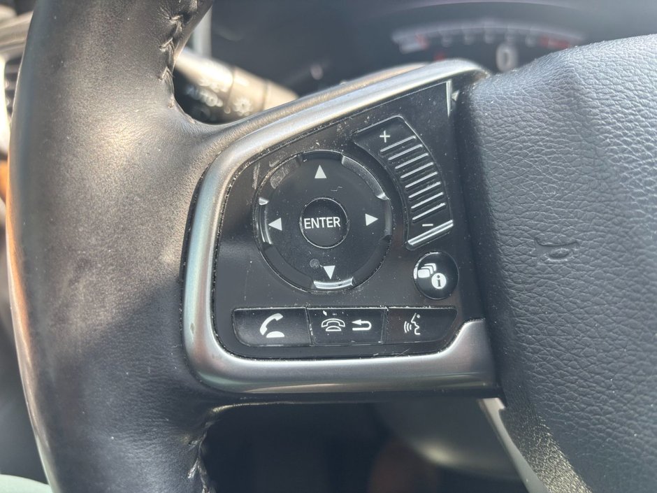2017 Honda CR-V Touring Great condition. Includes snows on Alloy rims.