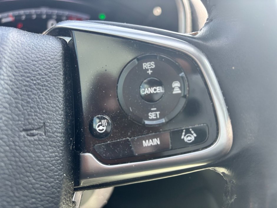 2017 Honda CR-V Touring Great condition. Includes snows on Alloy rims.