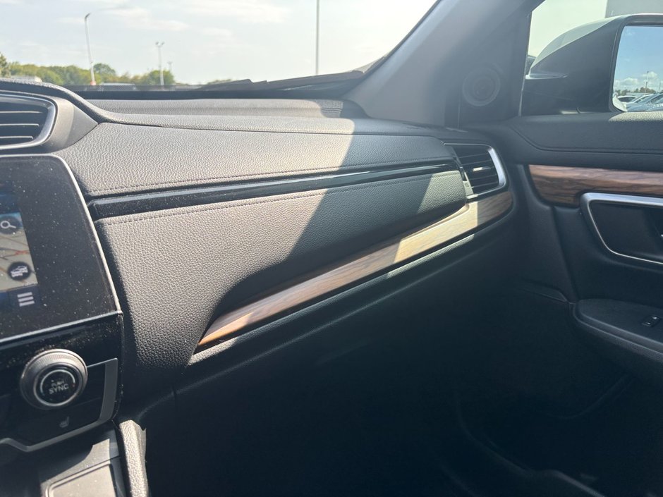 2017 Honda CR-V Touring Great condition. Includes snows on Alloy rims.