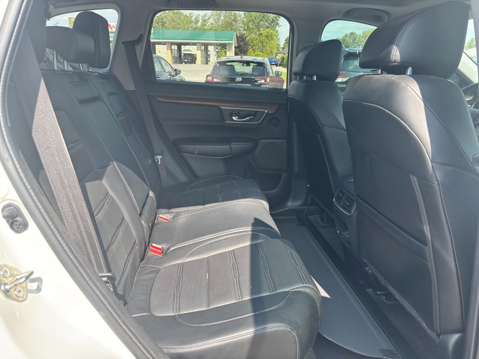 2017 Honda CR-V Touring Great condition. Includes snows on Alloy rims.