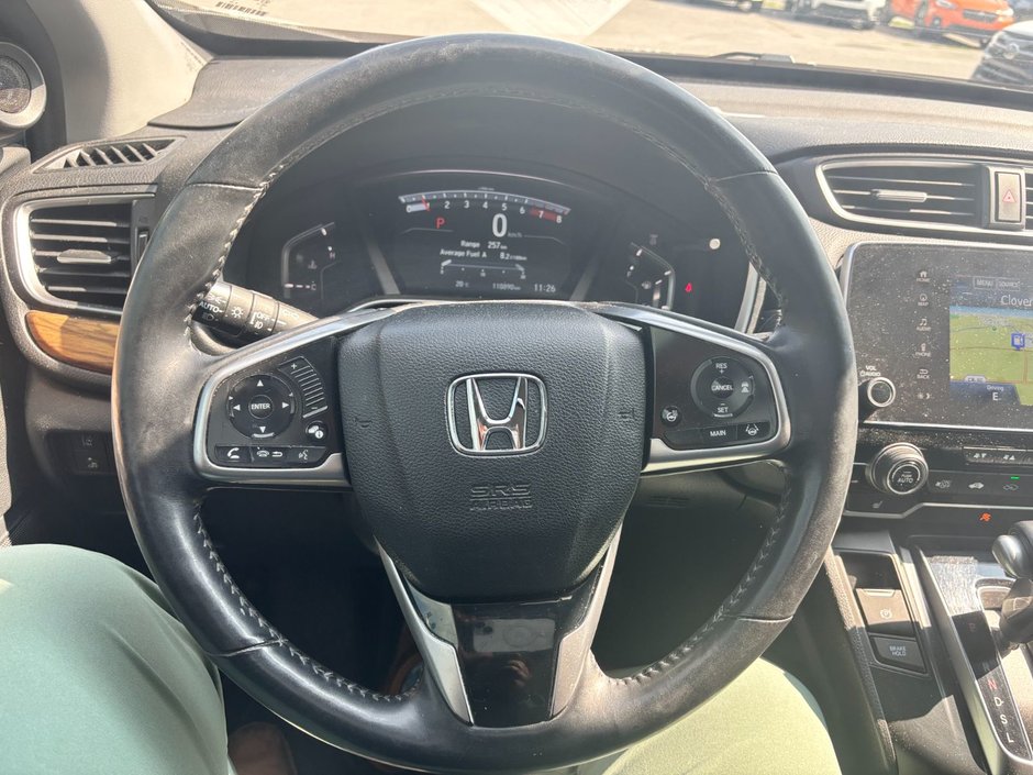 2017 Honda CR-V Touring Great condition. Includes snows on Alloy rims.