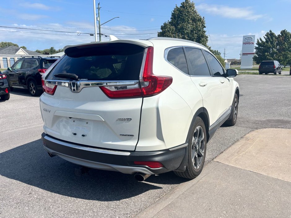 2017 Honda CR-V Touring Great condition. Includes snows on Alloy rims.