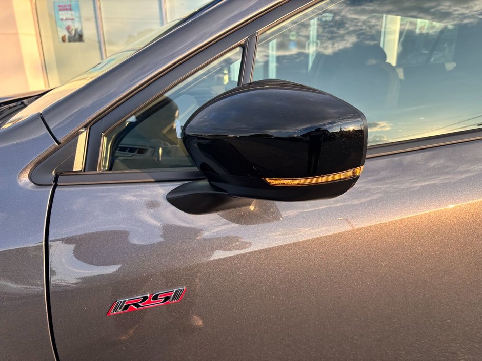 2025 Subaru Impreza RS 182-horsepower engine, and unique sporty styling elements inside and out.