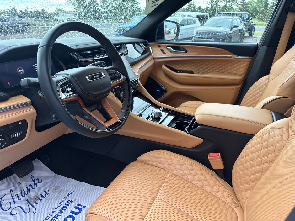 2023 Jeep Grand Cherokee 4xe Summit Reserve Upgraded leather  Macintosh audio system three TVs full roof
