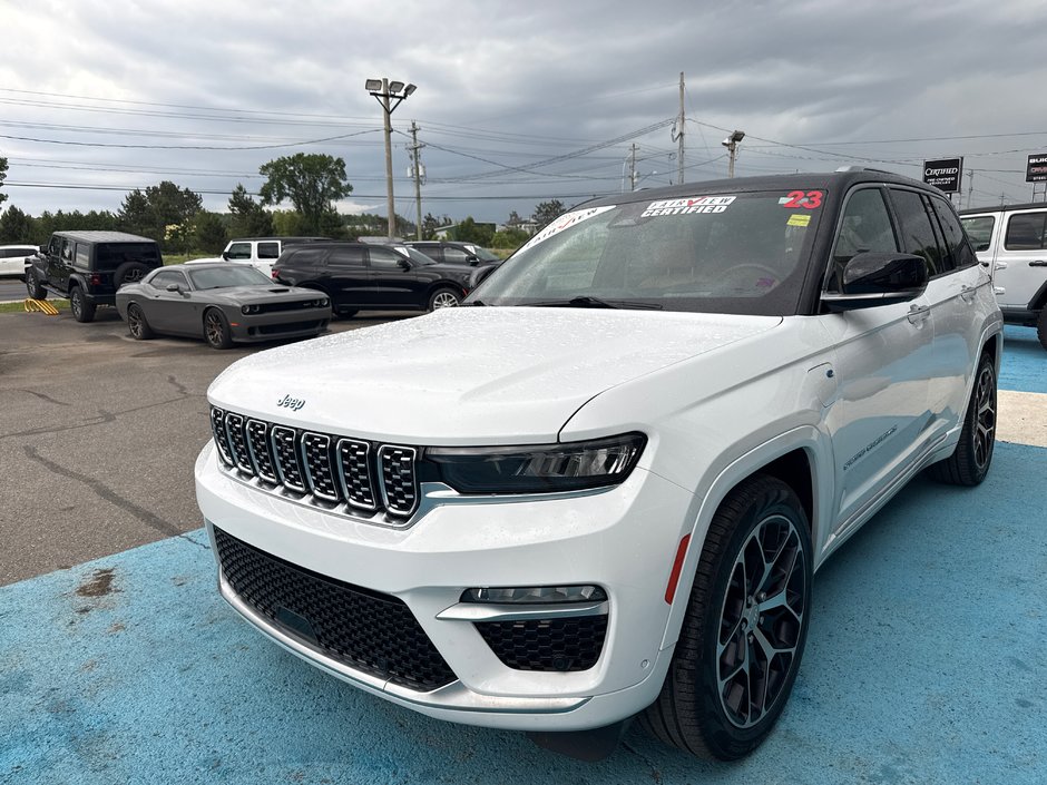 2023 Jeep Grand Cherokee 4xe Summit Reserve Upgraded leather  Macintosh audio system three TVs full roof