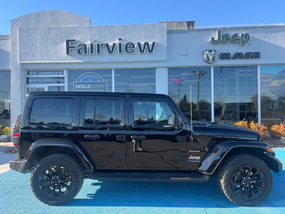 2021 Jeep Wrangler 4xe Unlimited Sahara Loaded with leather navigation BFG tires